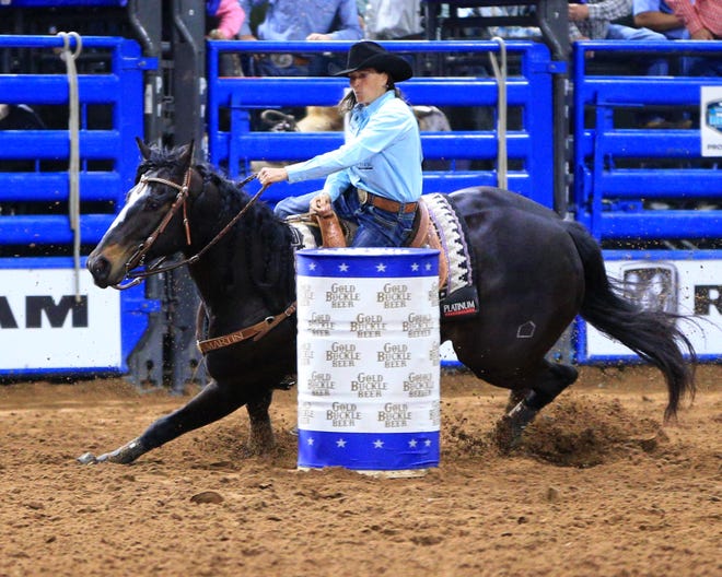 Lisa Lockhart won a national championship in the barrel racing Sunday at the Ram National Circuit Finals in Kissimmee, Fla.