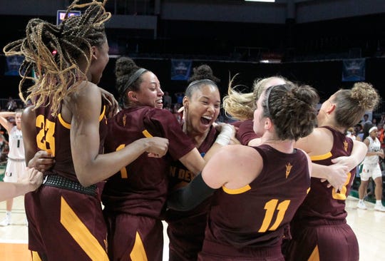 Arizona State players celebrate after defeating Miami 57-55 during a second round women's college basketball game in the NCAA Tournament, Sunday, March 24, 2019, in Coral Gables, Fla. (AP Photo/Luis M. Alvarez)