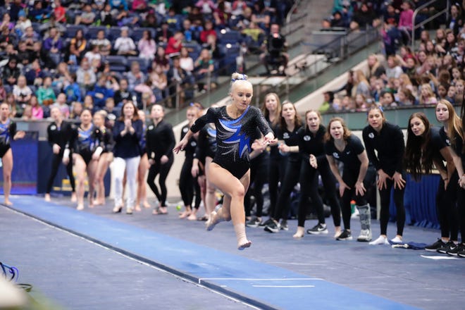 St. George native Rebekah Bean charges during her vault entry. Bean tore her ACL performing the vault on February 15th.
