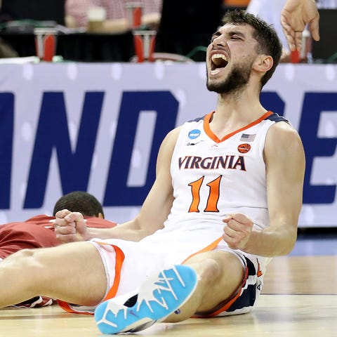 Virginia's Ty Jerome reacts in the Cavs' win over...