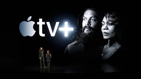 Actors Jason Momoa, left, and Alfre Woodard speak...