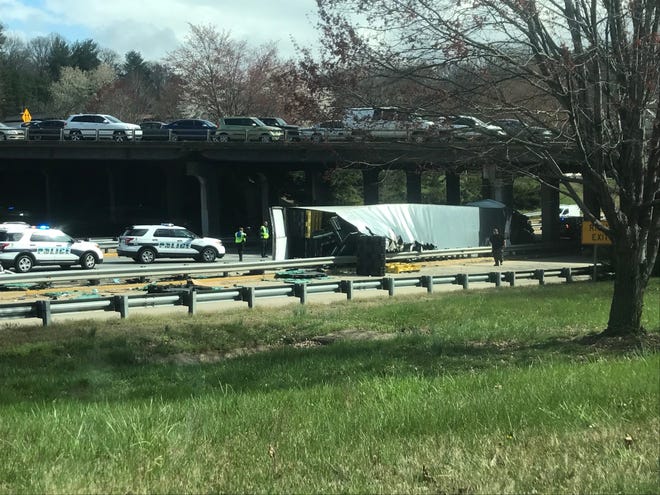 A tractor-trailer flipped over at about 3:15 p.m. Tuesday on Jackson's Curve on I-240 eastbound, snarling traffic on the Bowen Bridge and in downtown.