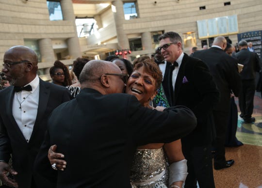 Sabrina Owens, Aretha Franklin's niece, is greeted at the Amazing Grace VIP pre-reception at Detroit's Charles H. Wright Museum on Monday, March 25, 2019. The screening of the film about the Gospel of Aretha Franklin has was projected on what would have been Franklin's 77th birthday.