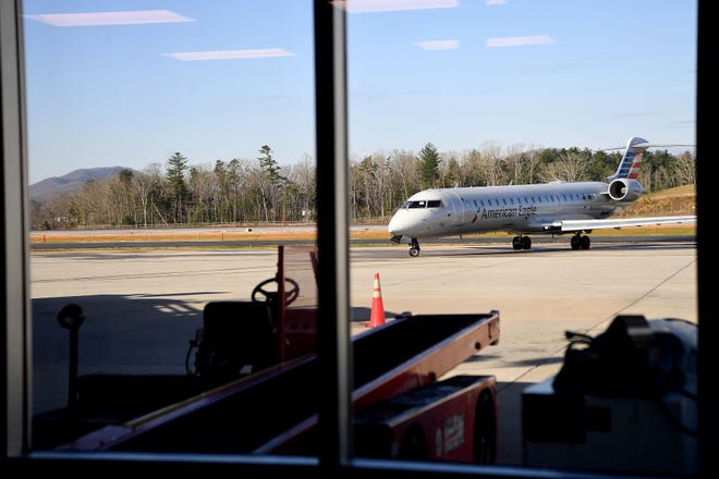 An American Eagle plane waits to take off at the Asheville Regional Airport on March 27, 2019. 