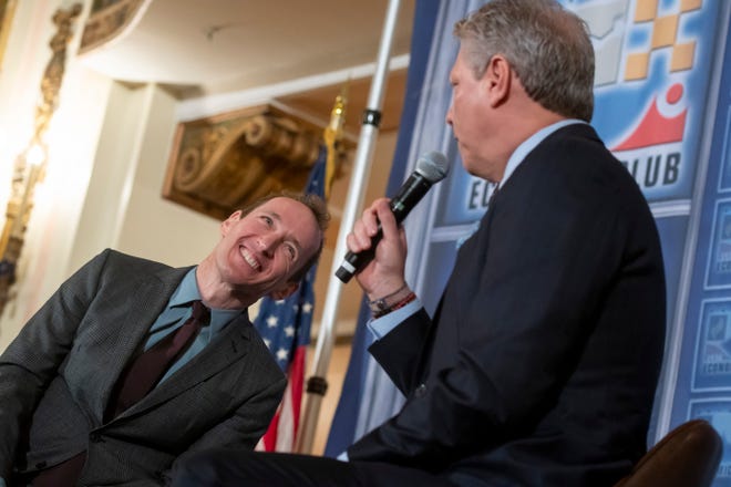 Oak Park native Jeffrey Seller, left, producer of the hit musical "Hamilton," goofs around while being interviewed by WDIV-TV's Devin Scillian during a Detroit Economic Club luncheon at Detroit's Masonic Temple.