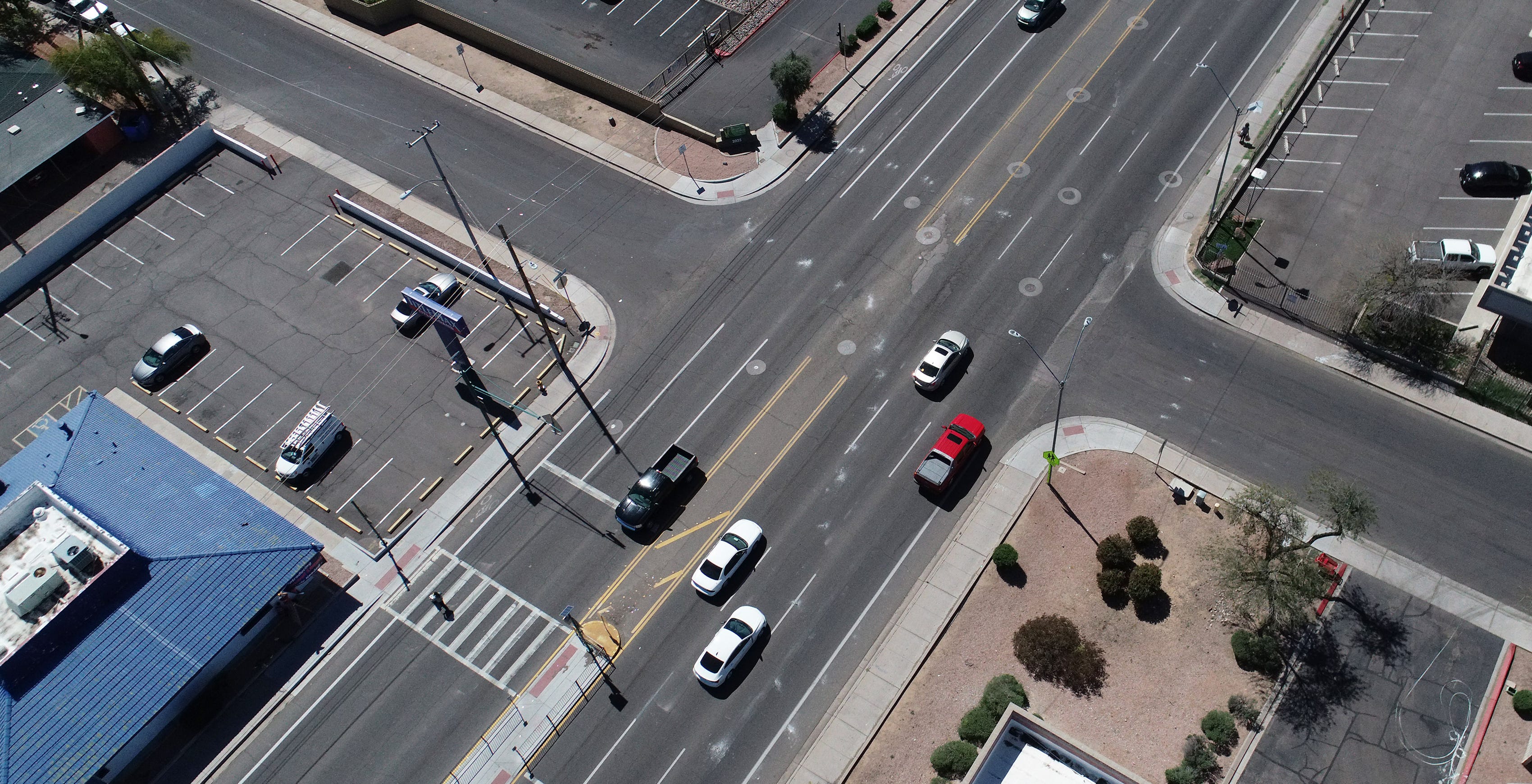 A midblock pedestrian crosswalk is seen on Indian School Road near 20th Avenue in Phoenix.