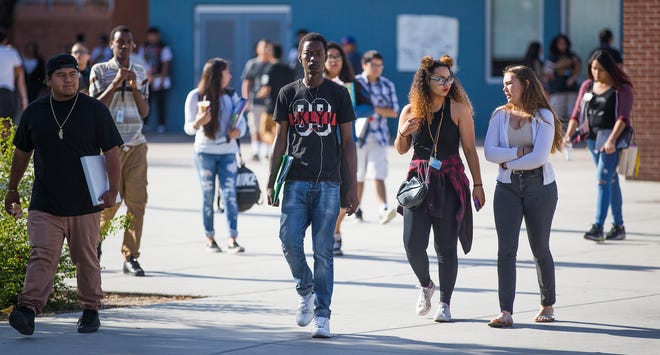 Students head to class at Camelback High School - part of the Phoenix Union High School District - on May 12, 2016.