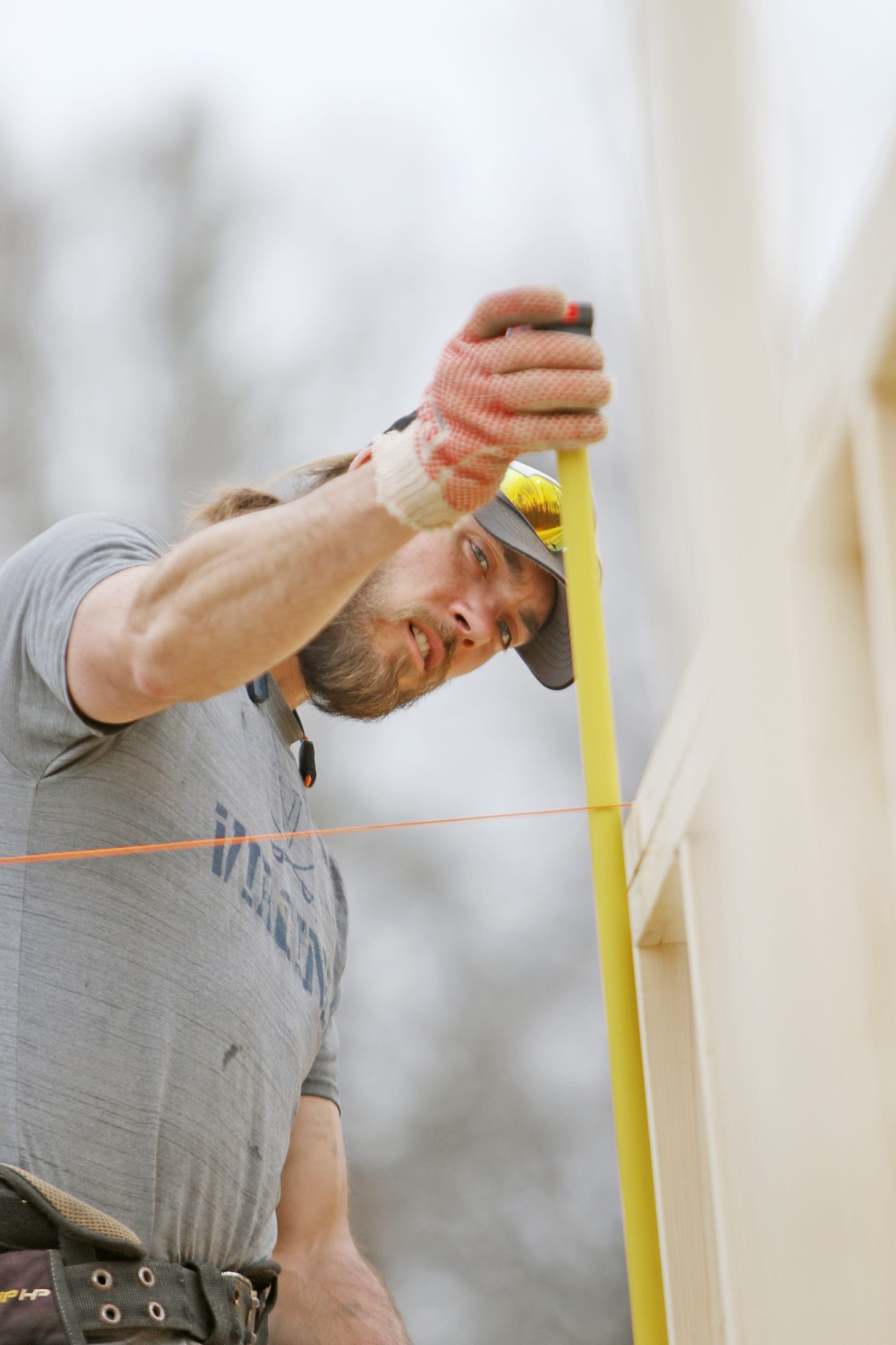 Getting a measure of freedom: Trevor Lane frames up a house in Crozet with Faith Builders Construction on Monday, March 25, 2019. Lane, who is serving out a drug conviction sentence at Middle River Regional Jail, got a job with the construction company as part of the work release program at Middle River which is designed to help with an inmate's transition back into the community.