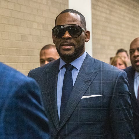 R. Kelly arrives for hearing at the Cook County...