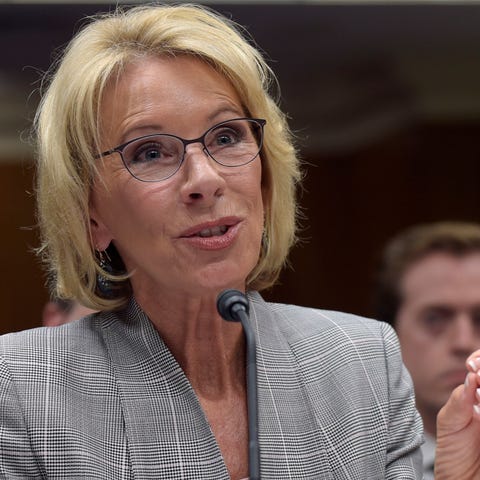 U.S. Secretary of Education Betsy DeVos doubled...