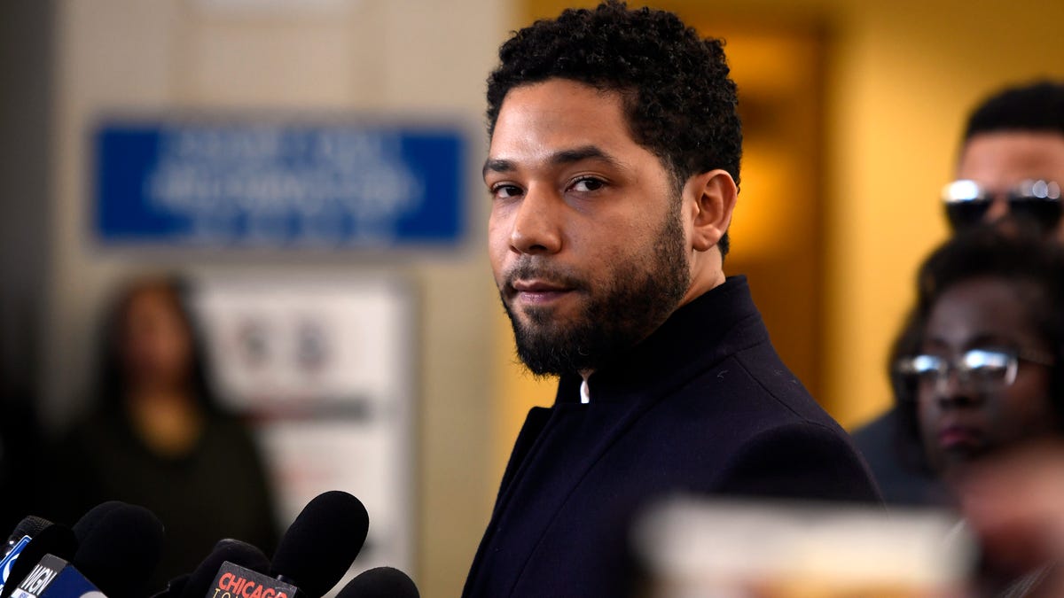 Actor Jussie Smollett talks to the media before leaving Cook County Court after his charges were dropped, Tuesday, March 26, 2019, in Chicago.