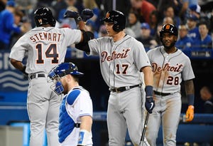 Tigers left fielder Christin Stewart (14) celebrates his two-run home run against the Toronto Blue Jays with Grayson Greiner (17) during the 10th inning.