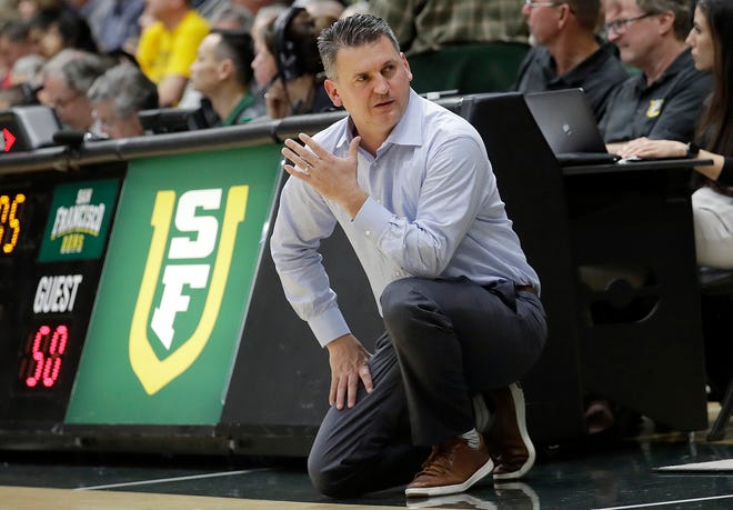 Washington State has hired Kyle Smith as its new men's basketball coach following the disappointing tenure of Ernie Kent.