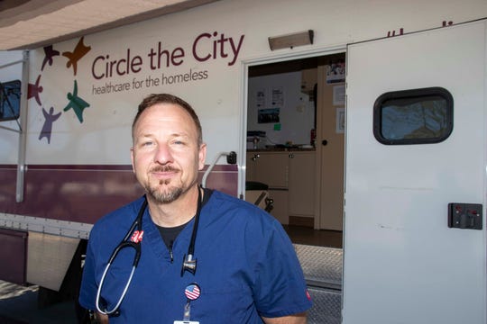Bobby Rhudy, nurse practitioner at Circle the City, works in a new mobile unit providing medical care to homeless people in Sunnyslope in partnership with HonorHealth John C. Lincoln Medical Center. The bus will treat patients 9 a.m. to 4 p.m. every Monday and Tuesday.