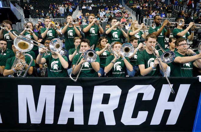 The Michigan State pep band plays during a practice in Washington, D.C., last month.