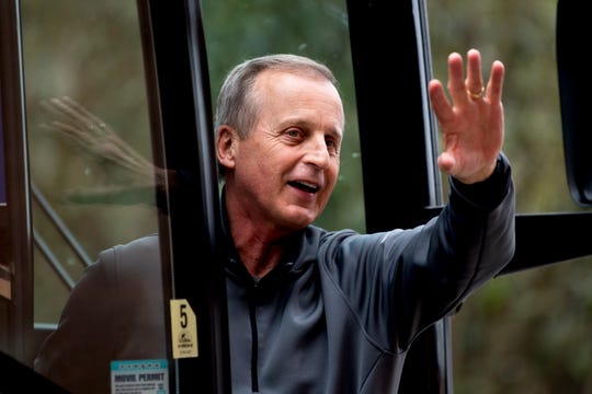Tennessee Head Coach Rick Barnes waves to fans from the bus upon returning to Stokley Hall in Knoxville, Tennessee on Friday, March 29, 2019. The Vols fell to Purdue Thursday night during the Sweet 16 of the NCAA tournament.