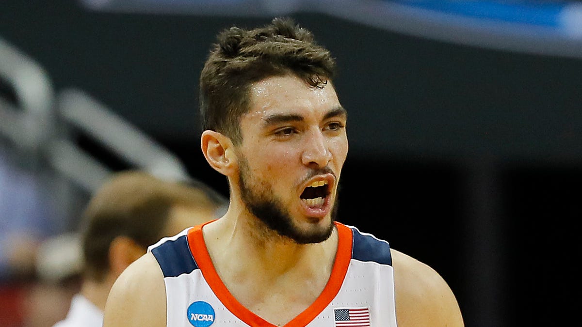 Ty Jerome #11 of the Virginia Cavaliers reacts after a three pointer against the Oregon Ducks during the first half of the 2019 NCAA Men's Basketball Tournament South Regional at the KFC YUM! Center on March 28.