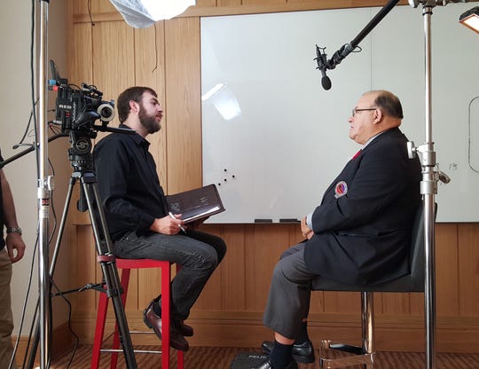 Director Joshua Riehl interviews coach Scotty Bowman at the 2015 Hall of Fame Inductions.