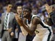 Michigan State forward Gabe Brown supports his team during the second half of MSU's 80-63 win over LSU in the NCAA tournament on Friday, March 29, 2019, in Washington.
