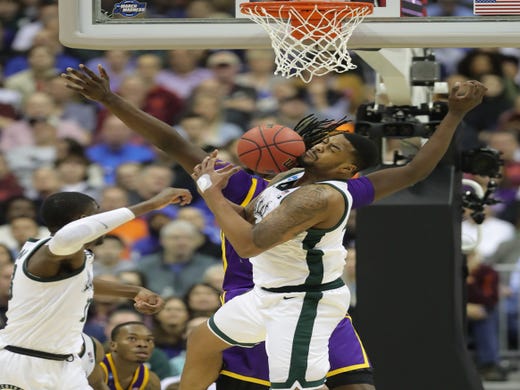Michigan State forward Nick Ward defends against LSU forward Naz Reid during the second half of MSU's 80-63 win over LSU in the NCAA tournament on Friday, March 29, 2019, in Washington.