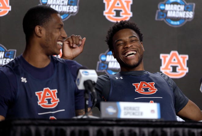 Auburn's Horace Spencer, left, and Malik Dunbar laugh during a news conference at the NCAA Tournament on Saturday, March 30, 2019, in Kansas City, Mo. Auburn is set to play Kentucky in the Midwest regional final on Sunday.