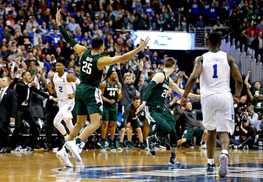 Michigan State Spartans forward Kenny Goins (25) reacts after the go-ahead three-pointer against the Duke Blue Devils in the championship game of the east regional of the 2019 NCAA Tournament at Capital One Arena, March 31, 2019.