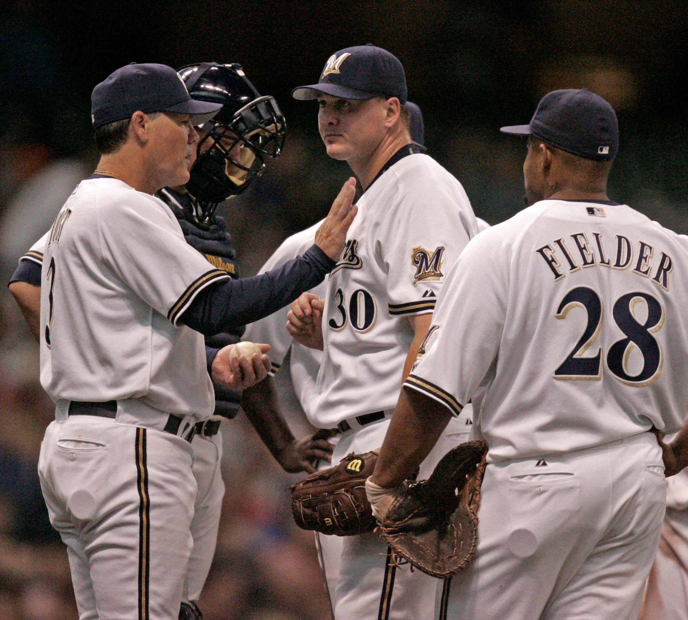 Arizona Diamondbacks pitcher Randy Johnson, right, hugs his daughter, Lexi,  left, during pregame ceremonies honoring Johnson's perfect game against the  Atlanta Barves on May 18, prior to the game against the San