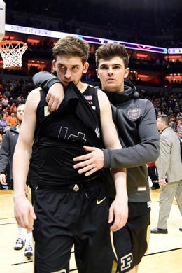 Elite Eight: No. 3 Purdue loses to No. 1 Virginia, 80-75 in overtime.