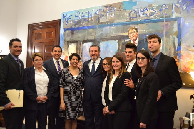 U.S. Sen. Ted Cruz, center, meets with relatives of the 'Citgo Six,' who are representatives of Citgo being held in Venezuela on April 2, 2019.