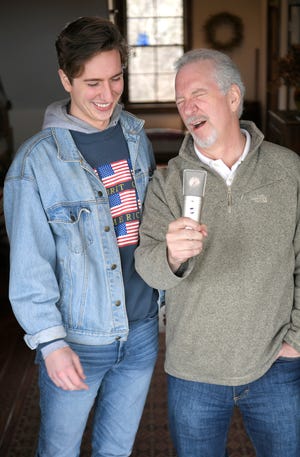 Popular conservative radio personality Phil Valentine goofs around with his son and podcast partner, Campbell, at their cabin in Brentwood on Thursday, March 7, 2019.