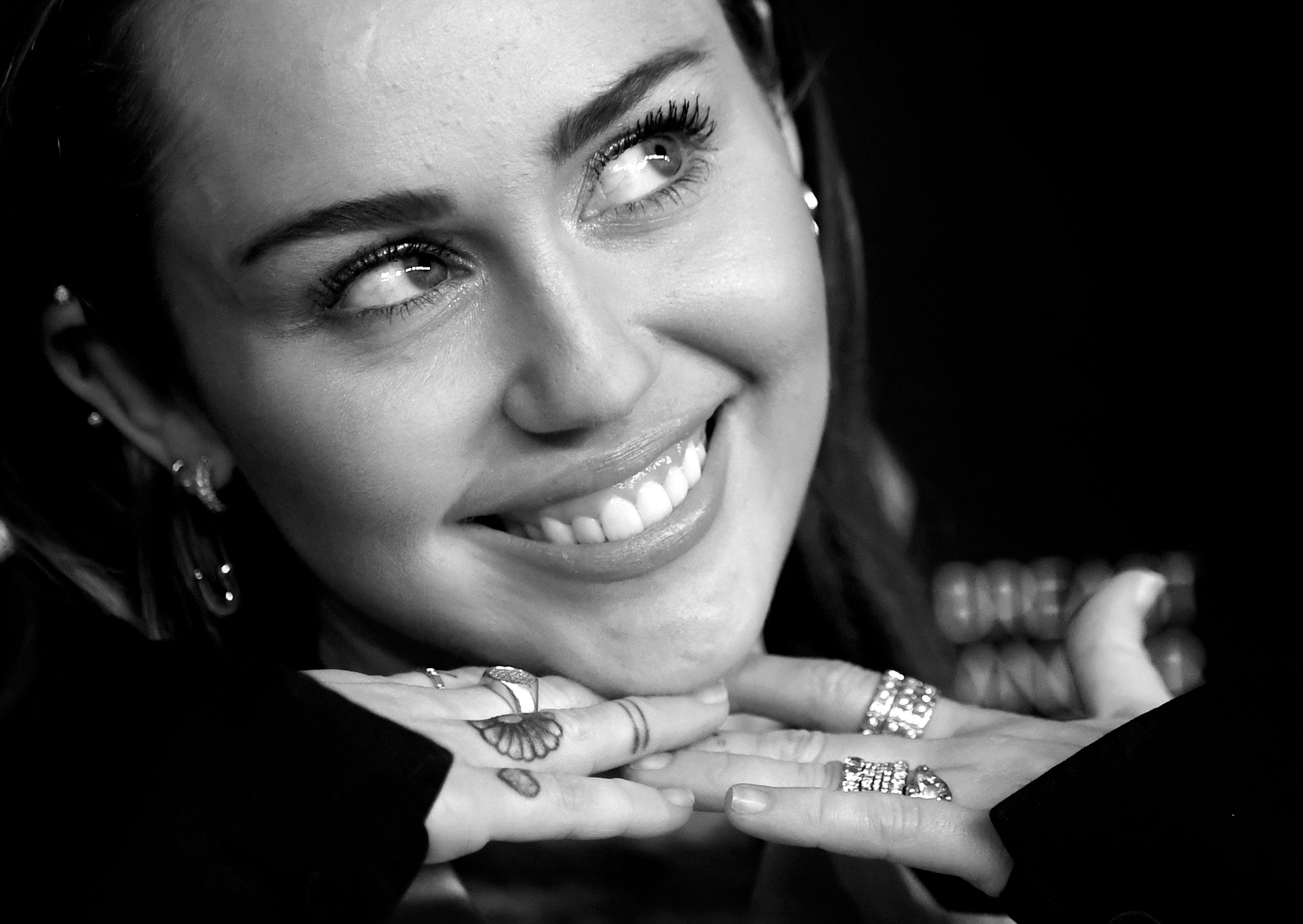 Miley Cyrus could be playing, or crying for help, with 'She Is Coming'
