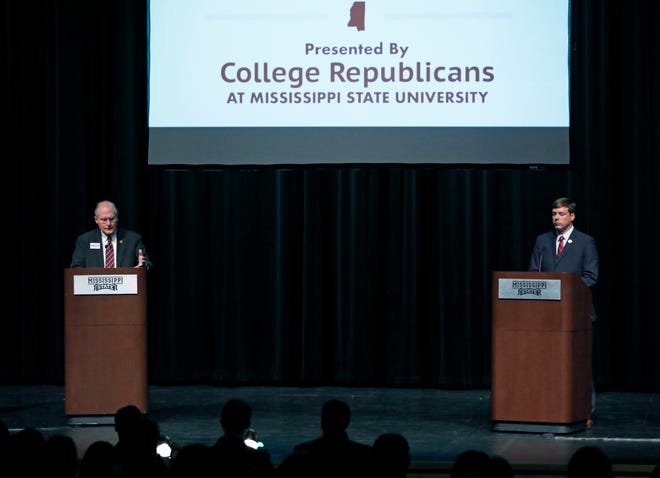 Former Supreme Court Chief Justice Bill Waller, left, gestures during a debate between himself and Rep. Robert Foster, R-Hernando, during a Mississippi Republican gubernatorial debate in Starkville, Miss., Tuesday, April 2, 2019. Republican Lt. Gov. Tate Reeves, also a candidate, did not take part in the debate.
