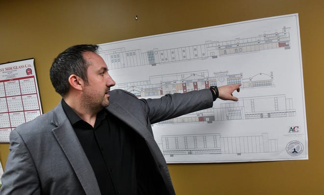 General manager Benjamin Copperthite talks about planned changes for Midtown Square storefronts Wednesday, April 3, in St. Cloud. 
