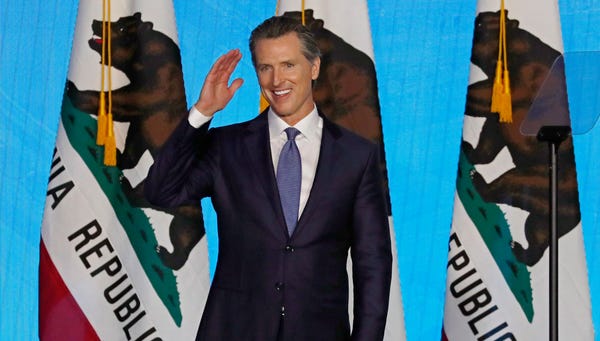 California Governor Gavin Newsom gestures after...