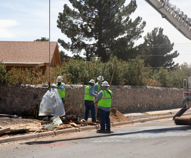 El Paso Electric crews work to remove an electrical transformer Thursday, April 4, 2019, after a vehicle plowed into an electrical pole at the intersection of Frank Maez and Spitz Street in Las Cruces.