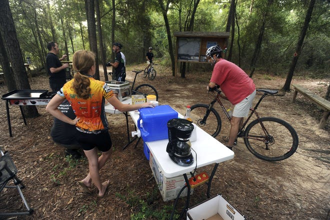Members of the Pensacola Off-Road Cyclists gather at the beginning of the UWF bike trail off of Pate Road for their prediction rides. John Blackie/jblackie@pnj.com
Members of the Pensacola Off-Road Cyclists gather at the beginning of the UWF bike trail off of Pate Rd. for their prediction rides.