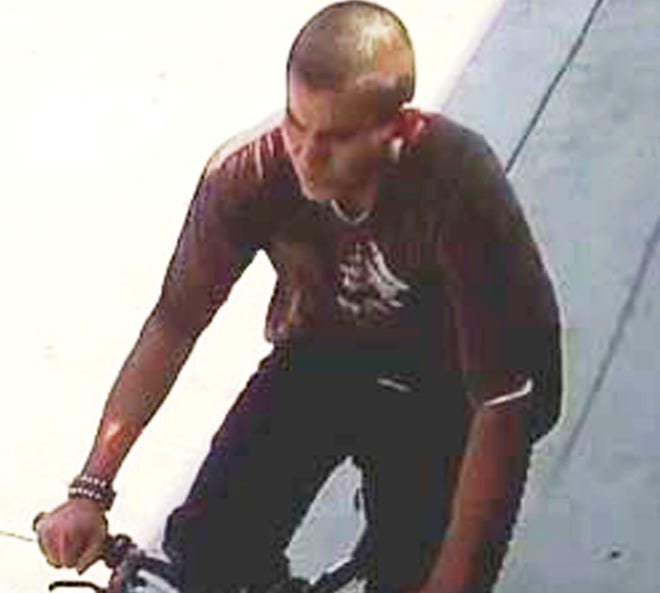 This undated photo released by the Los Angeles Police Department shows a person they were seeking in a series of slashing attacks in the city recently.