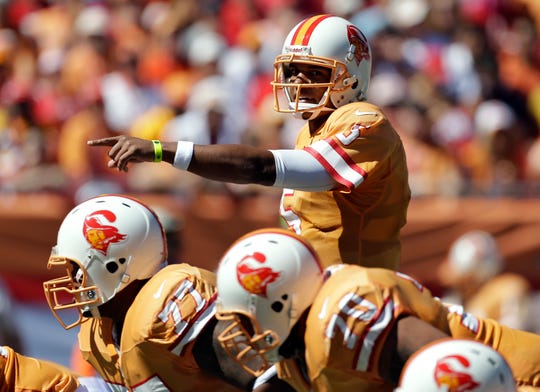 Quarterback Buccaneers, Josh Freeman, calls to play in a game against the Saints in 2012.