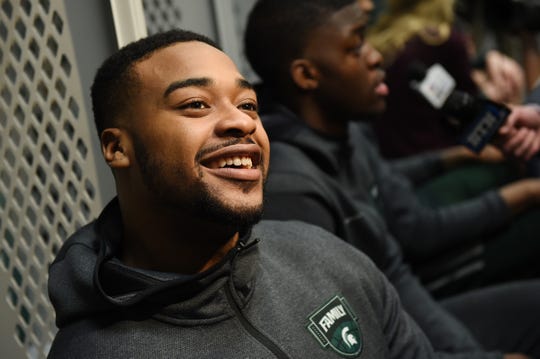 Michigan State Nick Ward (44) smiles during an interview in the Bank's US stadium locker room at the Final Four in Minneapolis, Minnesota, on Friday, April 5, 2019.