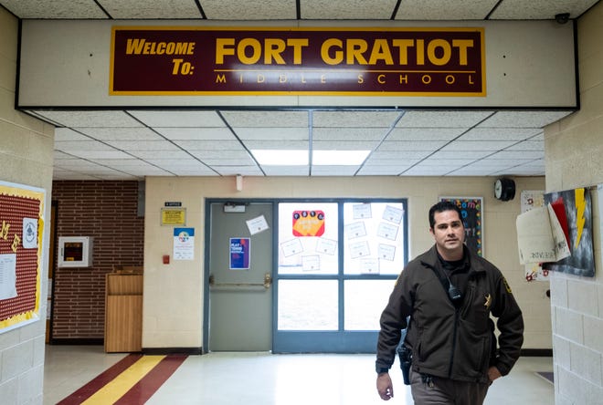 St. Clair County Sheriff Deputy Sean O'Donnell walks through the halls at Fort Gratiot Middle School Friday, April 5, 2019. O'Donnell will serve as the school resource officer between Fort Gratiot and Central middle schools based on where he is needed.