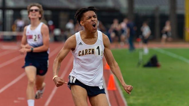 Cameron Angelle wins the 1600m run at The 2019 Beaver Club Relays. Friday, April 5, 2019.
