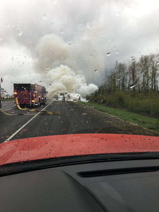 Marion County Fire District firefighters extinguish a fire in a motorhome April 6, 2019 on northbound I-5.