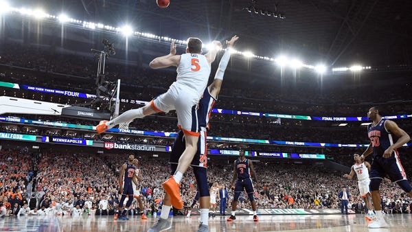 Virginia and Auburn discuss controversial foul...