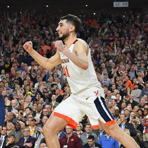 Virginia guard Ty Jerome reacts after defeating...