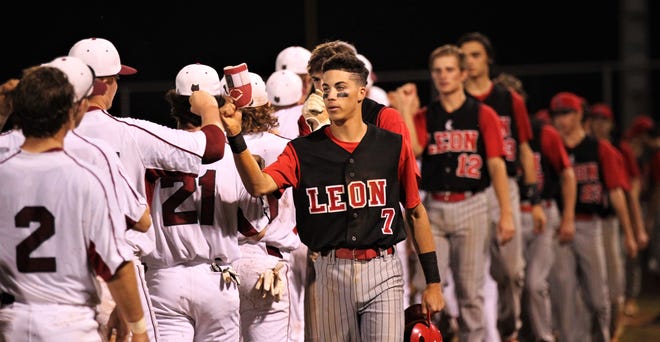 Leon senior True Fontenot leads the postgame handshake line as Chiles won an 11-6 home game against Leon on Friday, April 5, 2019, to force a season split. The Lions won 3-0 earlier in the week.
