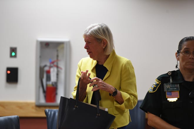 Martin County Commissioner Sarah Heard exits the courtroom for lunch break during jury selection on Monday, April 8, 2019, for her misdemeanor trial at the Martin County Courthouse in Stuart. Commissioner Heard is accused of two first-degree misdemeanor offenses of violating public records laws. The trial under Senior Judge James David Langford is expected to last through the week.  