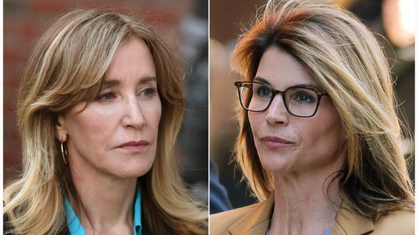 Actresses Felicity Huffman, left, and Lori...