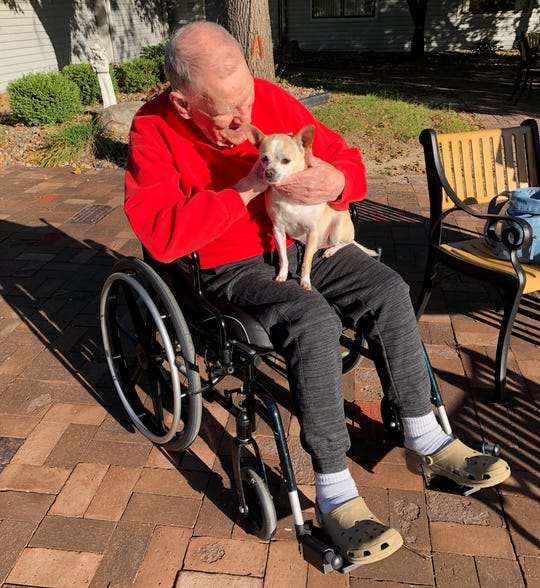 This is James "Milt" Ferguson Sr. with his dog Macaroni. He was 91 years old, a veteran of World War II and died from a head injury he received in the Veterans Affairs nursing home in Des Moines.