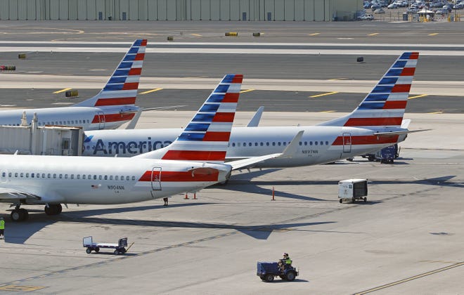Law enforcement met an American Airlines flight at Sky Harbor Airport Friday morning.