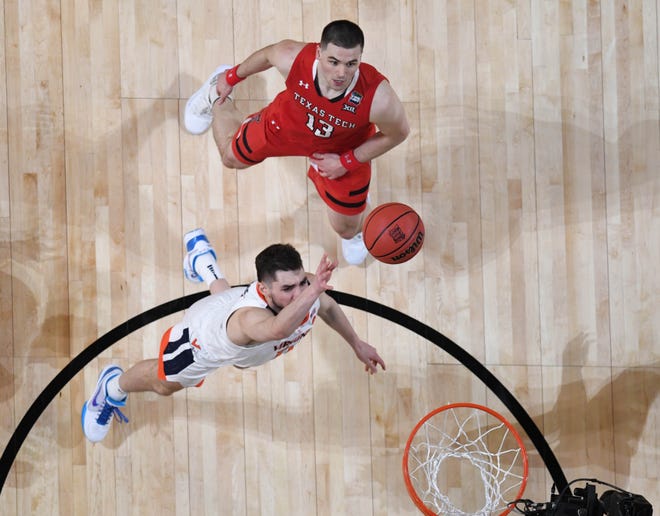 Apr 8, 2019; Minneapolis, MN, USA; Virginia Cavaliers guard Ty Jerome (11) shoots over Texas Tech Red Raiders guard Matt Mooney (13) in overtime in the championship game of the 2019 men's Final Four at US Bank Stadium. Mandatory Credit: Robert Deutsch-USA TODAY Sports